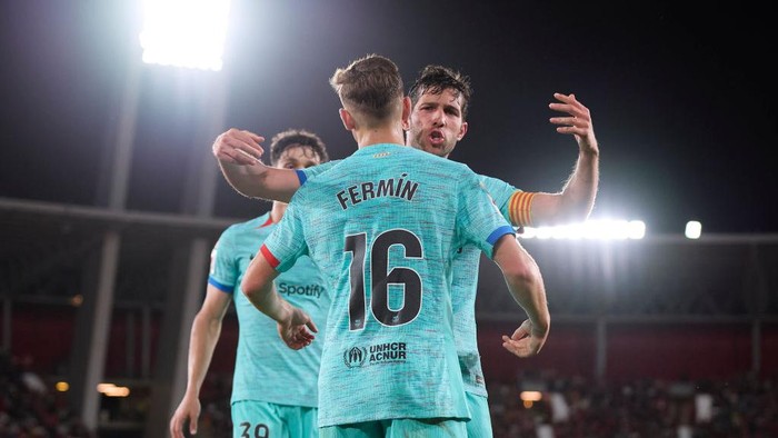 ALMERIA, SPAIN - MAY 16: Fermin Lopez of FC Barcelona celebrates after scoring his teams second goal during the LaLiga EA Sports match between UD Almeria and FC Barcelona at Juegos Mediterraneos on May 16, 2024 in Almeria, Spain. (Photo by Francisco Macia/Quality Sport Images/Getty Images)