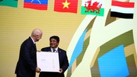 Dikatakan bahwa 10 stadion di Brasil dibangun khusus dan dikonfigurasikan untuk turnamen besar setelah menjadi tuan rumah Piala Dunia Putra 2014 dan tawaran tersebut memiliki posisi komersial dan komitmen pemerintah yang kuat. REUTERS/Chalinee Thirasupa