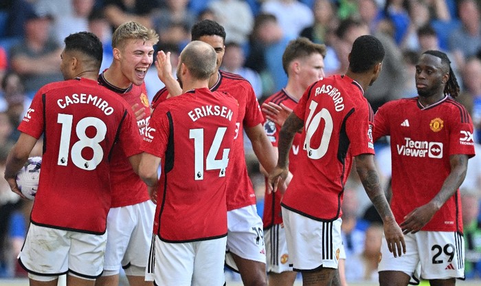 Manchester United Manchester United's Danish striker #11 Rasmus Hojlund (2L) celebrates scoring the team's second goal during the English Premier League football match between Brighton and Hove Albion and Manchester United at the American Express Community Stadium in Brighton, southern England on May 19, 2024. (Photo by Glyn KIRK / AFP) / RESTRICTED TO EDITORIAL USE. No use with unauthorized audio, video, data, fixture lists, club/league logos or 'live' services. Online in-match use limited to 120 images. An additional 40 images may be used in extra time. No video emulation. Social media in-match use limited to 120 images. An additional 40 images may be used in extra time. No use in betting publications, games or single club/league/player publications. /