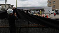 Penampakan Kain Hitam Penghalang Lansekap Gunung Fuji yang Viral