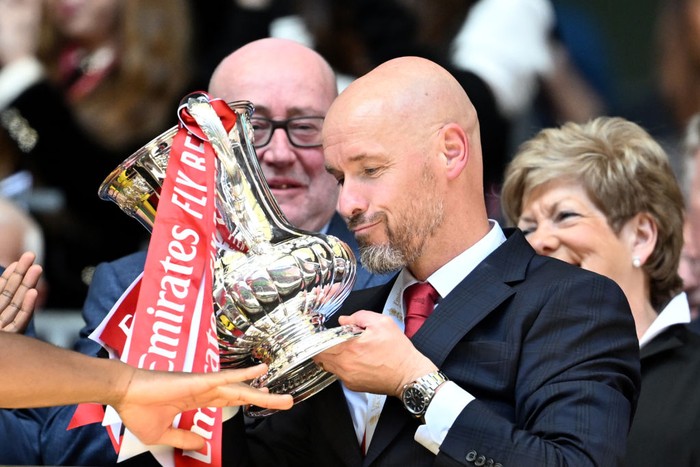 LONDON, ENGLAND - MAY 25:  Erik ten Hag, Manager of Manchester United, lifts the Emirates FA Cup Trophy after his teams victory after the Emirates FA Cup Final match between Manchester City and Manchester United at Wembley Stadium on May 25, 2024 in London, England. (Photo by Michael Regan - The FA/The FA via Getty Images)