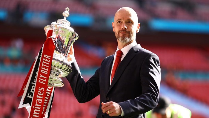 Erik ten Hag LONDON, ENGLAND - MAY 25: Erik ten Hag, Manager of Manchester United, celebrates with the Emirates FA Cup Trophy after his teams victory after the Emirates FA Cup Final match between Manchester City and Manchester United at Wembley Stadium on May 25, 2024 in London, England. (Photo by Ben Hoskins - The FA/The FA via Getty Images)