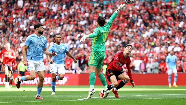 Soccer Football - FA Cup - Final - Manchester City v Manchester United - Wembley Stadium, London, Britain - May 25, 2024 Manchester City's Josko Gvardiol and Stefan Ortega in action with Manchester United's Alejandro Garnacho before Manchester United's Alejandro Garnacho scores their first goal REUTERS/Hannah Mckay