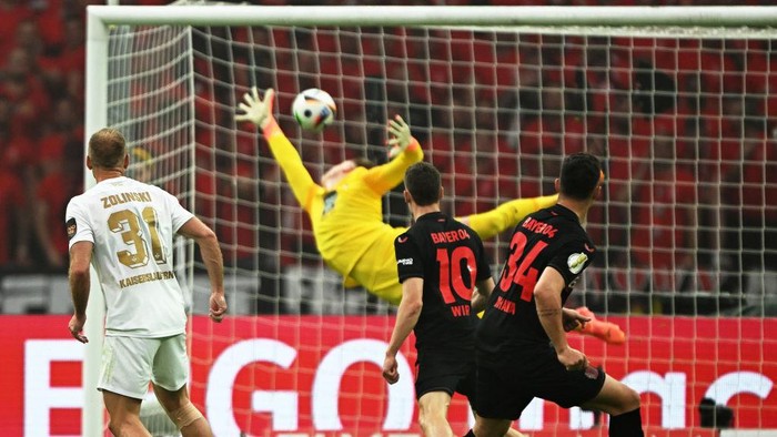25 May 2024, Berlin: Soccer: DFB Cup, 1. FC Kaiserslautern - Bayer Leverkusen, Final, Olympiastadion. Leverkusens Granit Xhaka (r) scores the goal to make it 1:0. IMPORTANT NOTE: In accordance with the regulations of the DFL German Football League and the DFB German Football Association, it is prohibited to use or have used photographs taken in the stadium and/or of the match in the form of sequential images and/or video-like photo series. Photo: Federico Gambarini/dpa (Photo by Federico Gambarini/picture alliance via Getty Images)