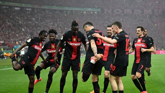 BERLIN, GERMANY - MAY 25: Granit Xhaka of Bayer 04 Leverkusen celebrates scoring his teams first goal with teammates during the DFB Cup 2023/24 final match between 1. FC Kaiserslautern and Bayer 04 Leverkusen at Olympiastadion on May 25, 2024 in Berlin, Germany. (Photo by Stuart Franklin/Getty Images)