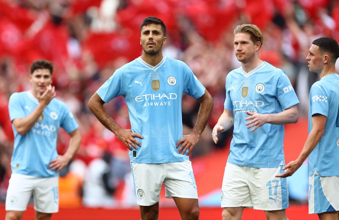 Soccer Football - FA Cup - Final - Manchester City v Manchester United - Wembley Stadium, London, Britain - May 25, 2024 Manchester Citys Rodri and Kevin De Bruyne look dejected after the match REUTERS/Hannah Mckay