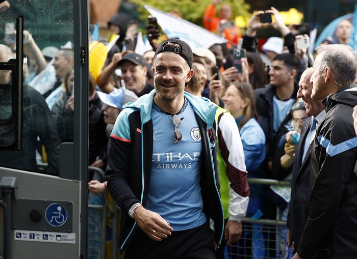 Soccer Football - Premier League - Manchester City Victory Parade - Manchester, Britain - May 26, 2024 Manchester Citys Jack Grealish ahead of the victory parade Action Images via Reuters/Jason Cairnduff EDITORIAL USE ONLY. NO USE WITH UNAUTHORIZED AUDIO, VIDEO, DATA, FIXTURE LISTS, CLUB/LEAGUE LOGOS OR LIVE SERVICES. ONLINE IN-MATCH USE LIMITED TO 120 IMAGES, NO VIDEO EMULATION. NO USE IN BETTING, GAMES OR SINGLE CLUB/LEAGUE/PLAYER PUBLICATIONS. PLEASE CONTACT YOUR ACCOUNT REPRESENTATIVE FOR FURTHER DETAILS..