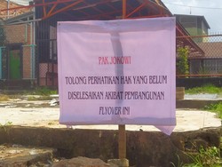 Pemilik Lahan Flyover Sekip Pasang Spanduk Minta Tolong ke Presiden Jokowi