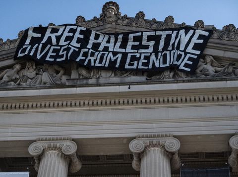NEW YORK, NEW YORK - MAY 31: Pro-Palestinian demonstrators associated with the 'Within Our Lifetime' protest group, drop a banner at the Brooklyn Museum on May 31, 2024 in New York City. Demonstrators started at Barclays Center and marched to the Brooklyn Museum where they occupied the inside lobby and the outside demanding that the Brooklyn Museum divest from investments in Israel.   Stephanie Keith/Getty Images/AFP (Photo by STEPHANIE KEITH / GETTY IMAGES NORTH AMERICA / Getty Images via AFP)