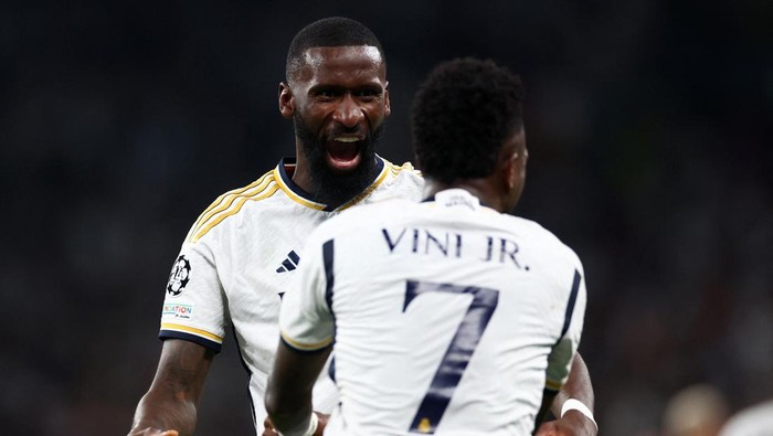 Soccer Football - Champions League - Final - Borussia Dortmund v Real Madrid - Wembley Stadium, London, Britain - June 1, 2024 Real Madrids Vinicius Junior celebrates scoring their second goal with Antonio Rudiger REUTERS/Carl Recine