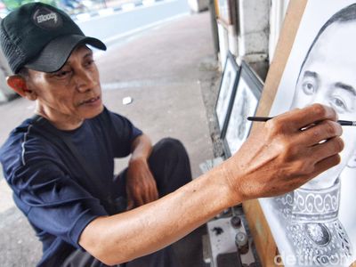 Potret Pelukis Jalanan di Surabaya