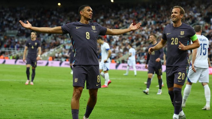 Soccer Football - International Friendly - England v Bosnia and Herzegovina - St James Park, Newcastle, Britain - June 3, 2024 Englands Trent Alexander-Arnold celebrates scoring their second goal with Harry Kane Action Images via Reuters/Lee Smith