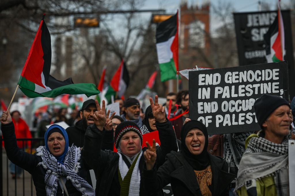 EDMONTON, CANADA - APRIL 27:Members of the Palestinian diaspora, supported by the local Muslim community and activists from left-wing parties, including the Communist Party of Canada, rally for Gaza under the banner 'End Genocide Now' through Edmonton's Whyte Avenue, on April 27, 2024, in Edmonton, Alberta, Canada. (Photo by Artur Widak/NurPhoto via Getty Images)