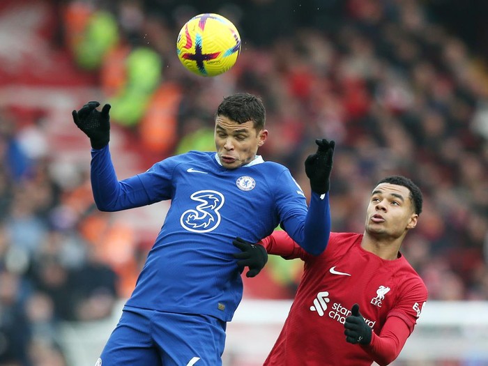 LIVERPOOL, ENGLAND - JANUARY 21: Thiago Silva of Chelsea jumps for the ball with Cody Gakpo of Liverpool during the Premier League match between Liverpool FC and Chelsea FC at Anfield on January 21, 2023 in Liverpool, England. (Photo by Chelsea FC/Chelsea FC via Getty Images)