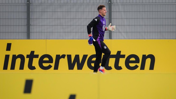 05 June 2024, Bavaria, Herzogenaurach: Soccer: National team, European Championship preparation, training camp - training. Goalkeeper Marc-Andre ter Stegen warming up. Photo: Christian Charisius/dpa (Photo by Christian Charisius/picture alliance via Getty Images)