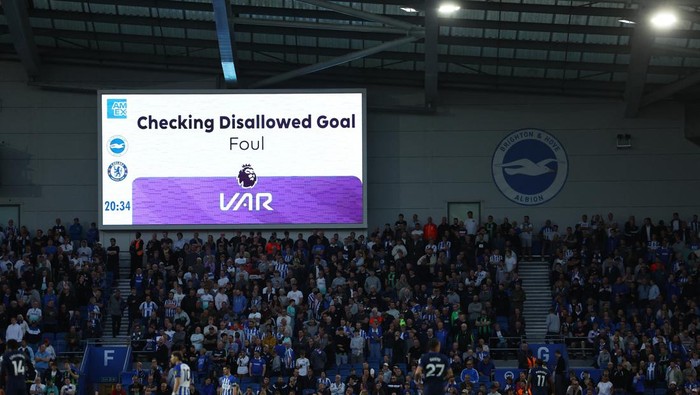 Soccer Football - Premier League - Brighton & Hove Albion v Chelsea - The American Express Community Stadium, Brighton, Britain - May 15, 2024 General view of the big screen as a goal for Chelsea is disallowed after a VAR review REUTERS/Toby Melville EDITORIAL USE ONLY. NO USE WITH UNAUTHORIZED AUDIO, VIDEO, DATA, FIXTURE LISTS, CLUB/LEAGUE LOGOS OR LIVE SERVICES. ONLINE IN-MATCH USE LIMITED TO 120 IMAGES, NO VIDEO EMULATION. NO USE IN BETTING, GAMES OR SINGLE CLUB/LEAGUE/PLAYER PUBLICATIONS. PLEASE CONTACT YOUR ACCOUNT REPRESENTATIVE FOR FURTHER DETAILS..