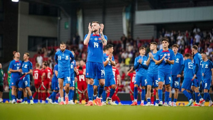 TRNAVA, SLOVAKIA - JUNE 9: Milan Skriniar of Slovakia and team mates celebrate their victory after the international friendly match between Slovakia and Wales at Anton Malatinsky Stadium on June 9, 2024 in Trnava, Slovakia.(Photo by Christian Hofer/Getty Images)