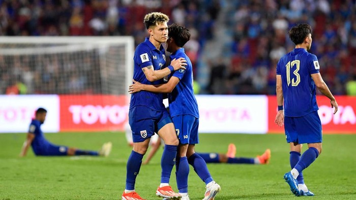 BANGKOK, THAILAND - JUNE 11: Suphanan Bureerat of Thailand (L) shows dejection after the FIFA World Cup Asian second qualifier Group C match between Thailand and Singapore at Rajamangala National Stadium on June 11, 2024 in Bangkok, Thailand. (Photo by Apinya Rittipo/Getty Images)