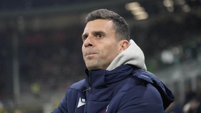 Bolognas head coach Thiago Motta waits for the start of an Italian Cup round of 16 soccer match between Inter Milan and Bologna, at the San Siro stadium in Milan, Italy, Wednesday, Dec. 20, 2023. (AP Photo/Luca Bruno)