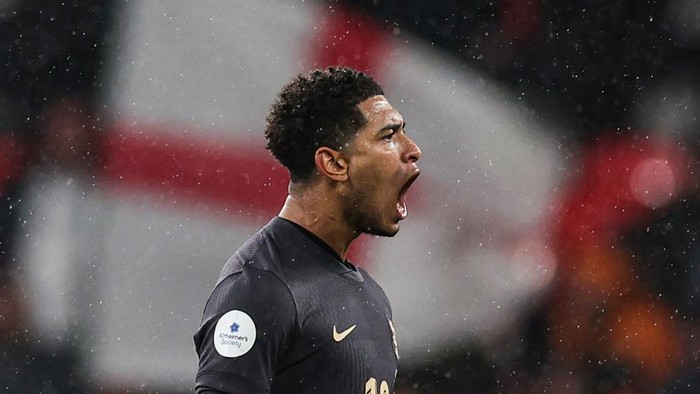 Englands midfielder #10 Jude Bellingham celebrates after scoring his team second goal during the International friendly football match between England and Belgium at Wembley stadium, in London, on March 26, 2024. (Photo by Adrian DENNIS / AFP) / NOT FOR MARKETING OR ADVERTISING USE / RESTRICTED TO EDITORIAL USE