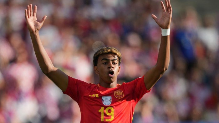 15 June 2024, Berlin: Soccer: UEFA Euro 2024, European Championship, Spain - Croatia, preliminary round, Group B, matchday 1, Olympiastadion Berlin, Spains Lamine Yamal reacts during the match. Photo: Sören Stache/dpa (Photo by Sören Stache/picture alliance via Getty Images)