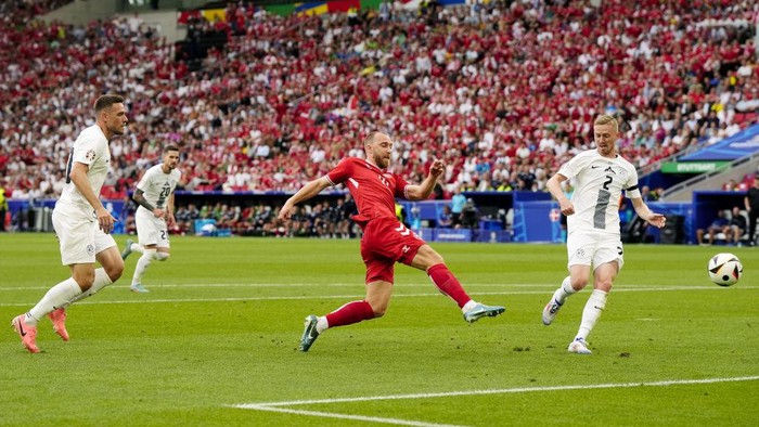 Denmarks Christian Eriksen scores the opening goal of the game during the UEFA Euro 2024 Group C match at the Stuttgart Arena in Stuttgart, Germany. Picture date: Sunday June 16, 2024. (Photo by Nick Potts/PA Images via Getty Images)