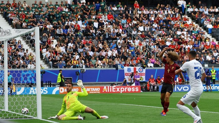 Soccer Football - Euro 2024 - Group E - Belgium v Slovakia - Frankfurt Arena, Frankfurt, Germany - June 17, 2024 Slovakias Ivan Schranz scores their first goal past Belgiums Koen Casteels REUTERS/Lee Smith
