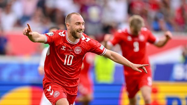 Christian Eriksen STUTTGART, GERMANY - JUNE 16: Christian Eriksen of Denmark celebrates after scoring his team's first goal with teammates during the UEFA EURO 2024 group stage match between Slovenia and Denmark at Stuttgart Arena on June 16, 2024 in Stuttgart, Germany. (Photo by Harry Langer/DeFodi Images via Getty Images)