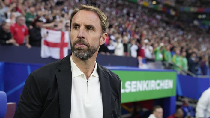 Gareth Southgate England coach Gareth Southgate stands near the benches before a Group C match between Serbia and England at the Euro 2024 soccer tournament in Gelsenkirchen, Germany, Monday, June 17, 2024. (AP Photo/Thanassis Stavrakis)