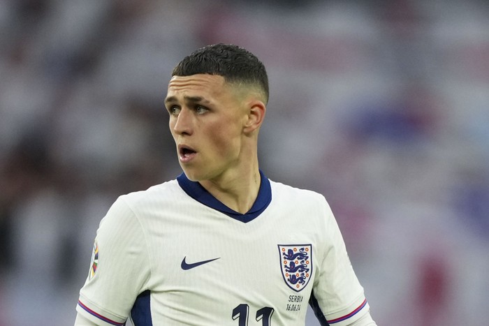 Englands Phil Foden looks on during a Group C match between Serbia and England at the Euro 2024 soccer tournament in Gelsenkirchen, Germany, Sunday, June 16, 2024. (AP Photo/Martin Meissner)