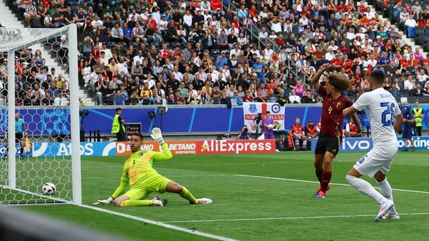 Soccer Football - Euro 2024 - Group E - Belgium v Slovakia - Frankfurt Arena, Frankfurt, Germany - June 17, 2024 Slovakia's Ivan Schranz scores their first goal past Belgium's Koen Casteels REUTERS/Lee Smith