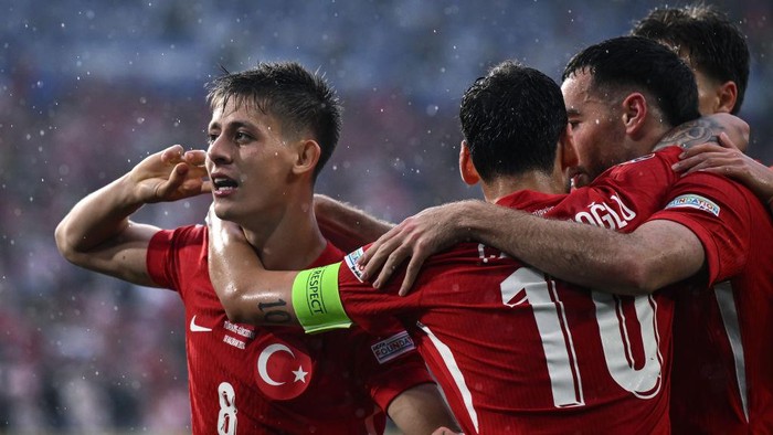 DORTMUND, GERMANY - JUNE 18: Arda Guler of Turkiye celebrates after scoring his teams second goal during the UEFA EURO 2024 group stage match between Turkiye and Georgia at Football Stadium Dortmund on June 18, 2024 in Dortmund, Germany. (Photo by Image Photo Agency/Getty Images)