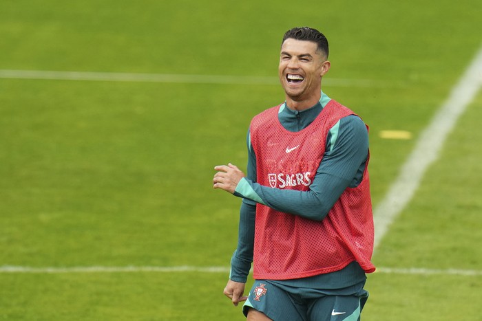 Portugal's Cristiano Ronaldo gestures during a training session in Gutersloh, Germany, Friday, June 14, 2024. Portugal will play against Czech Republic during their Group F soccer match at the Euro 2024 soccer tournament on June 18. (AP Photo/Hassan Ammar)