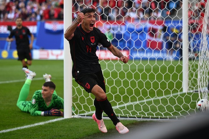 HAMBURG, GERMANY - JUNE 19: Qazim Laci (14) of Albania celebrates after scoring a goal during the 2024 European Football Championship (EURO 2024) Group B football match between Croatia and Albania at Volksparkstadion in Hamburg, Germany on June 19, 2024. (Photo by Halil Sagirkaya/Anadolu via Getty Images)
