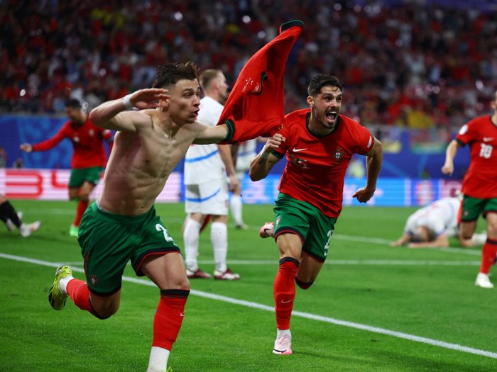 Soccer Football - Euro 2024 - Group F - Portugal v Czech Republic - Leipzig Stadium, Leipzig, Germany - June 18, 2024  Portugal's Francisco Conceicao celebrates scoring their second goal with Pedro Neto REUTERS/Lisi Niesner