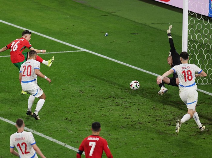 Soccer Football - Euro 2024 - Group F - Portugal v Czech Republic - Leipzig Stadium, Leipzig, Germany - June 18, 2024  Portugal's Francisco Conceicao scores their second goal REUTERS/Karina Hessland