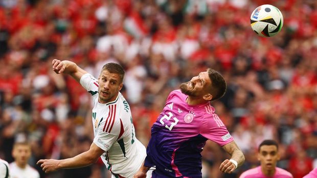Soccer Football - Euro 2024 - Group A - Germany v Hungary - Stuttgart Arena, Stuttgart, Germany - June 19, 2024 Hungary's Barnabas Varga in action with Germany's Robert Andrich REUTERS/Kai Pfaffenbach