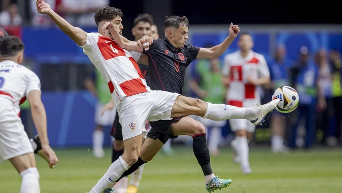 HAMBURG, GERMANY - JUNE 19: (L-R) Josko Gvardiol of Croatia, Jasir Asani of Albania  during the  EURO match between Croatia  v Albania  at the Volksparkstadium on June 19, 2024 in Hamburg Germany (Photo by Eric Verhoeven/Soccrates/Getty Images)