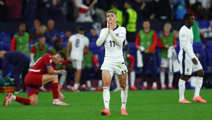 Soccer Football - Euro 2024 - Group C - Serbia v England - Arena AufSchalke, Gelsenkirchen, Germany - June 16, 2024 Englands Phil Foden reacts after the match REUTERS/Kai Pfaffenbach