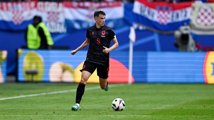 HAMBURG, GERMANY - JUNE 19: Jasir Asani (9) of Albania in action during the 2024 European Football Championship (EURO 2024) Group B football match between Croatia and Albania at Volksparkstadion in Hamburg, Germany on June 19, 2024. (Photo by Halil Sagirkaya/Anadolu via Getty Images)