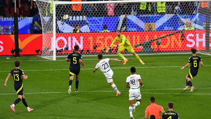COLOGNE, GERMANY - JUNE 19: Xherdan Shaqiri of Switzerland scores his teams first goal during the UEFA EURO 2024 group stage match between Scotland and Switzerland at Cologne Stadium on June 19, 2024 in Cologne, Germany. (Photo by Charles McQuillan - UEFA/UEFA via Getty Images)
