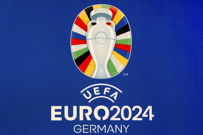 The official logo for the UEFA EURO 2024 in Germany is presented during the UEFA EURO 2024 brand launch in Berlin, Germany, Tuesday, Oct. 5, 2021. Germany will host the UEFA EURO 2024 soccer tournament. (AP Photo/Michael Sohn)