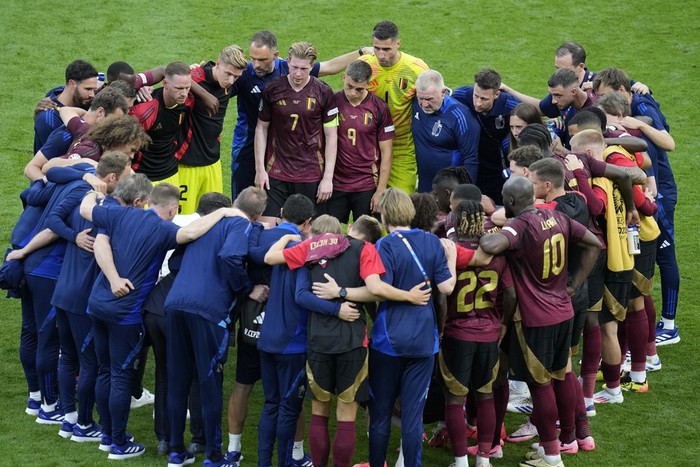 Belgium players gather at the end of the Group E match between Belgium and Slovakia at the Euro 2024 soccer tournament in Frankfurt, Germany, Monday, June 17, 2024. Slovakia won 1-0. (AP Photo/Themba Hadebe)