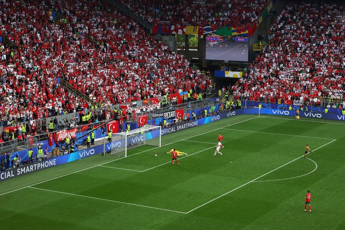 DORTMUND, GERMANY - JUNE 22: A general view as Bruno Fernandes of Portugal scores his team's third goal past Altay Bayindir of Turkiye during the UEFA EURO 2024 group stage match between Turkiye and Portugal at Football Stadium Dortmund on June 22, 2024 in Dortmund, Germany. (Photo by Kevin C. Cox/Getty Images)