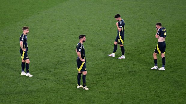 Soccer Football - Euro 2024 - Group A - Scotland v Hungary - Stuttgart Arena, Stuttgart, Germany - June 23, 2024 Scotland's Grant Hanley looks dejected after the match REUTERS/Angelika Warmuth     TPX IMAGES OF THE DAY