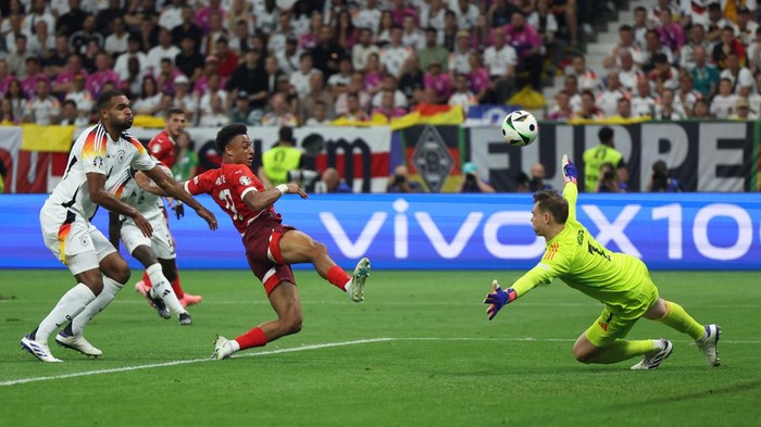 Soccer Football - Euro 2024 - Group A - Switzerland v Germany - Frankfurt, Germany - June 23, 2024 Switzerlands Dan Ndoye scores their first goal REUTERS/Thilo Schmuelgen