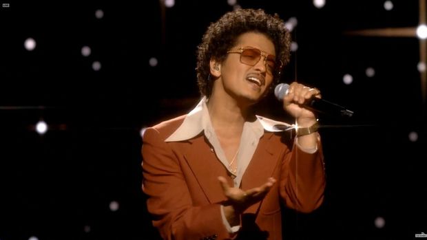 UNSPECIFIED: In this screengrab released on March 14, Bruno Mars of music group Silk Sonic performs onstage during the 63rd Annual GRAMMY Awards broadcast on March 14, 2021.   Theo Wargo/Getty Images for The Recording Academy/AFP (Photo by Theo Wargo / GETTY IMAGES NORTH AMERICA / Getty Images via AFP)