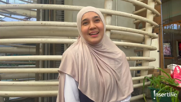 Dhini Aminarti