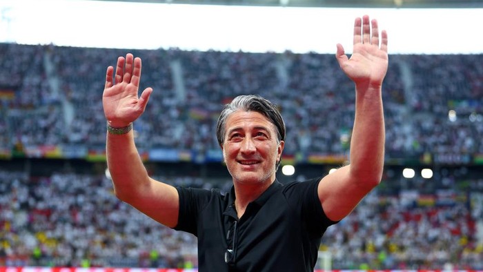 FRANKFURT AM MAIN, GERMANY - JUNE 23: Switzerland coach Murat Yakin salutes the supporters ahead of the UEFA EURO 2024 group stage match between Switzerland and Germany at Frankfurt Arena on June 23, 2024 in Frankfurt am Main, Germany. (Photo by Chris Brunskill/Fantasista/Getty Images)