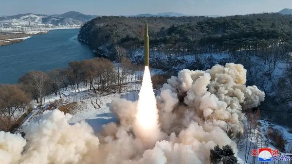 Ballistic missile, said to be solid-fuel and hypersonic, launches during a test at an unspecified location in North Korea in this picture released by the Korean Central News Agency on January 14, 2024. (Reuters)